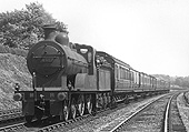 Midland Railway 4-4-0 2P No 450 is in fine fettle at it works the Pines Express near Northfield on 6th August 1921