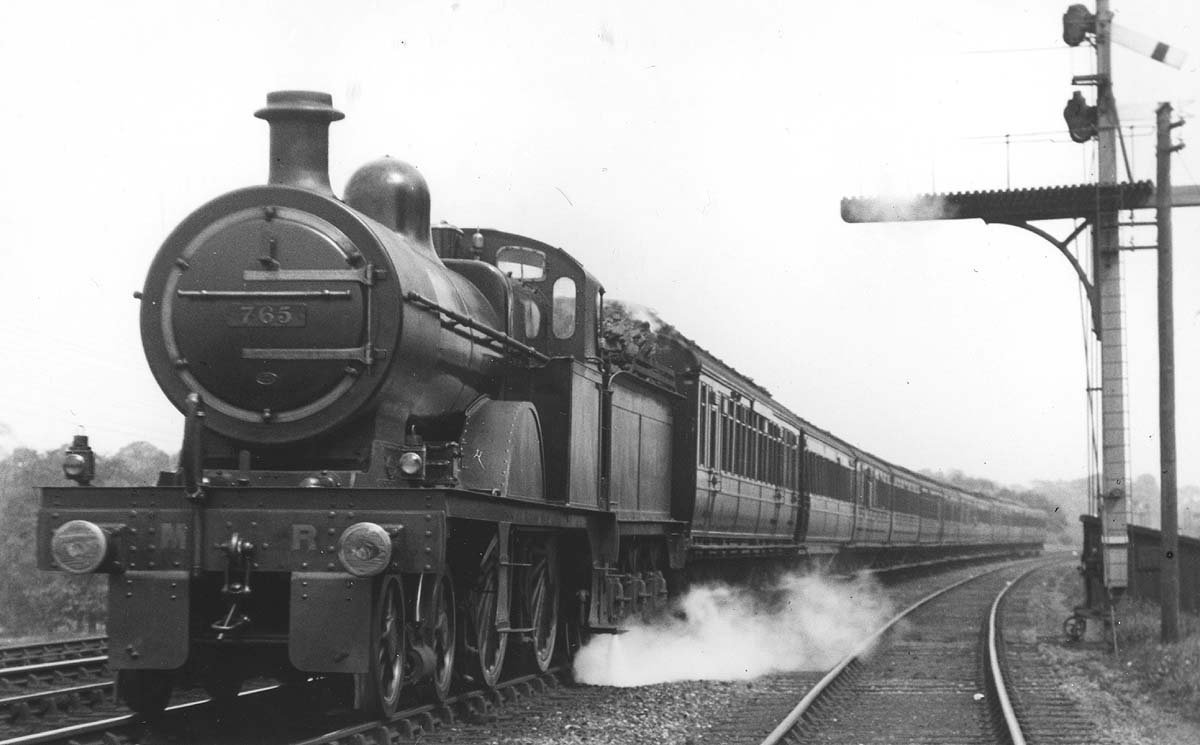 MR 3P 4-4-0 No 765 passes the signal with injectors full on as it works a down express near Northfield circa 1921