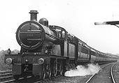 MR 3P 4-4-0 No 765 passes the signal with injectors full on as it works a down express near Northfield circa 1921