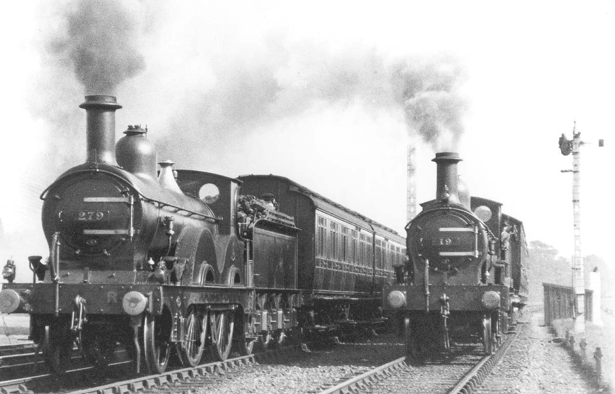 MR 1P 2-4-0 No 279 passes MR 1P 2-4-0 No 19 which is at the head of a one-coach local working on 1st October 1921