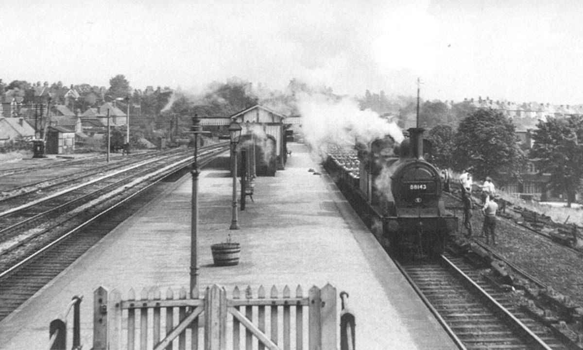 Ex-MR 2F 0-6-0 No 58143 is seen at the head of a Permanent Way working on Sunday 8th August 1954
