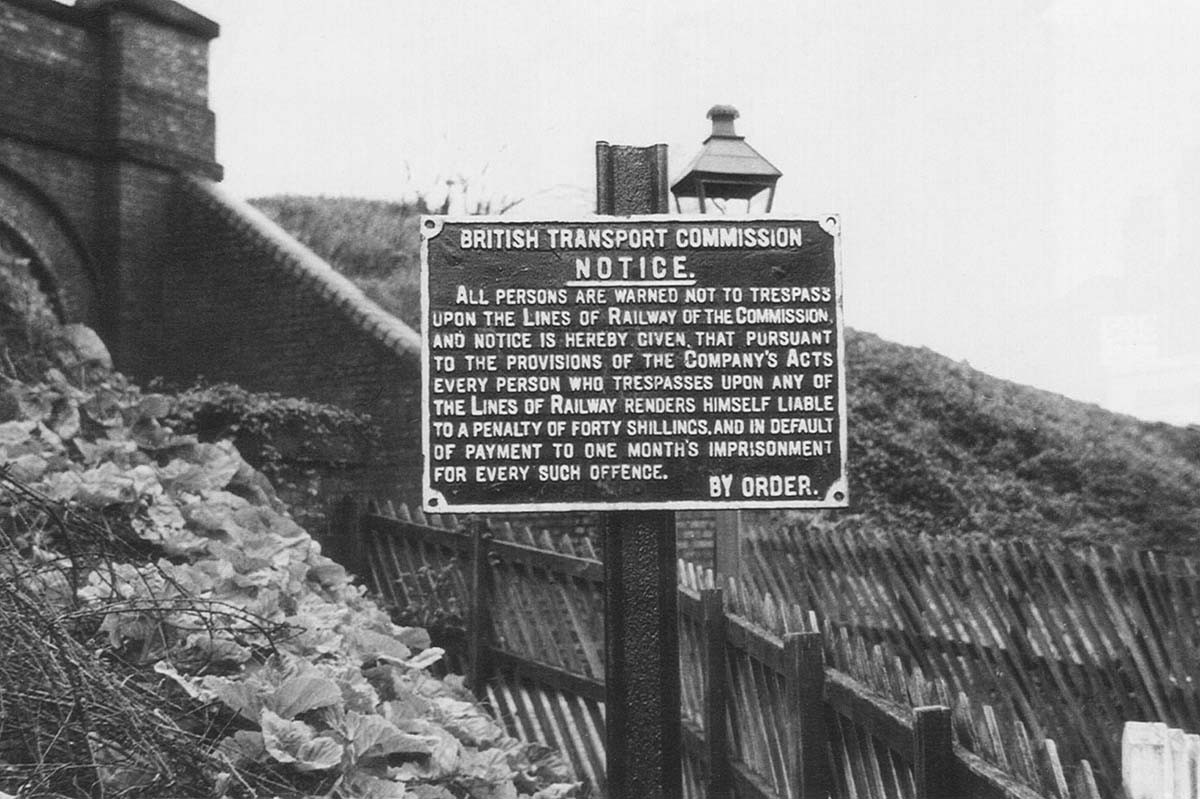 View of a British Transport Commission cast iron notice board seen displayed at Northfield station on 16th May 1955