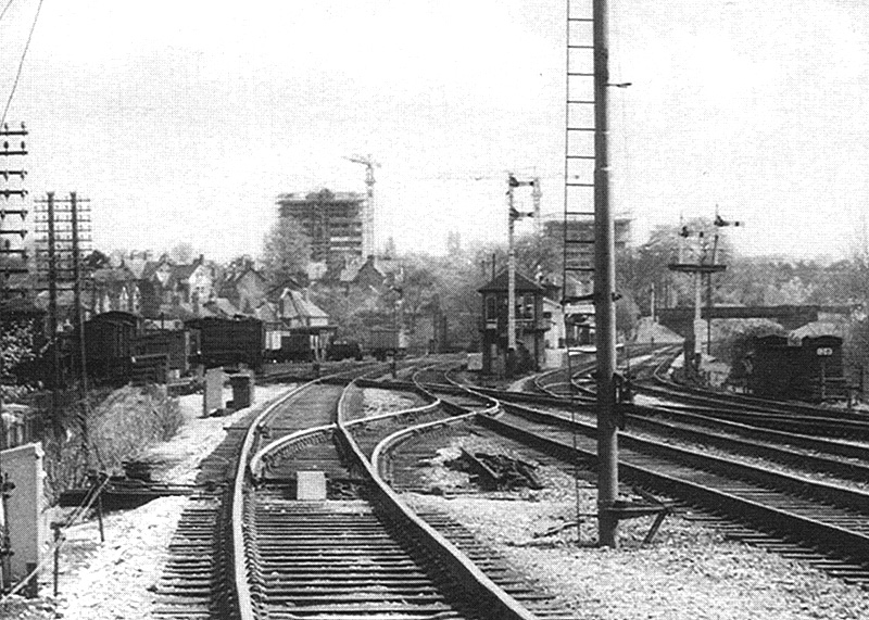 Close up showing the MR bracket signals on the down goods line and the pair of LMS signals mounted on a single tubular post on the down main line
