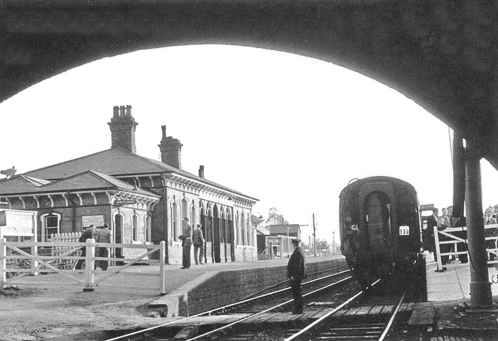 Looking towards Birmingham beneath the bridge carrying the Midland Road over the railway in April 1957