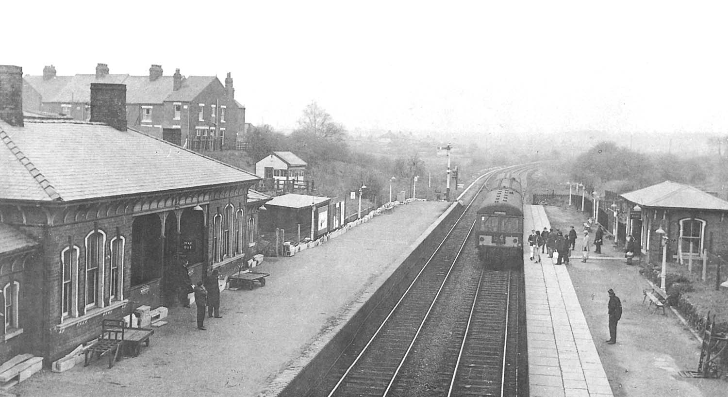 Looking in the direction of Birmingham as a three-car Craven DMU set arrives from New Street station on 2nd March 1968