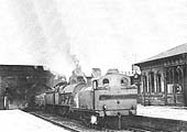 An unidentified ex-LMS 0-6-0 locomotive pilots an unknown ex-LNWR 0-8-0 locomotive through Abbey Street