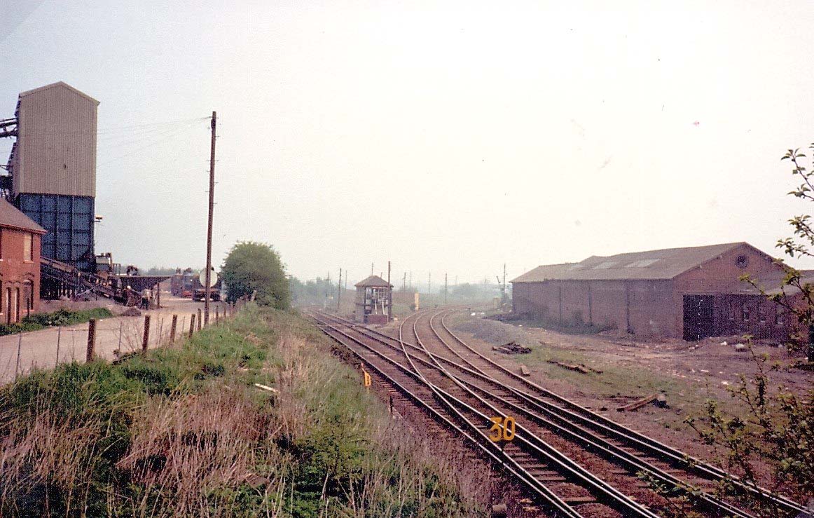 Looking eastwards towards Abbey Junction Signal Cabin in the centre of the junction and on the right 'Conners' goods shed circa early 1970s
