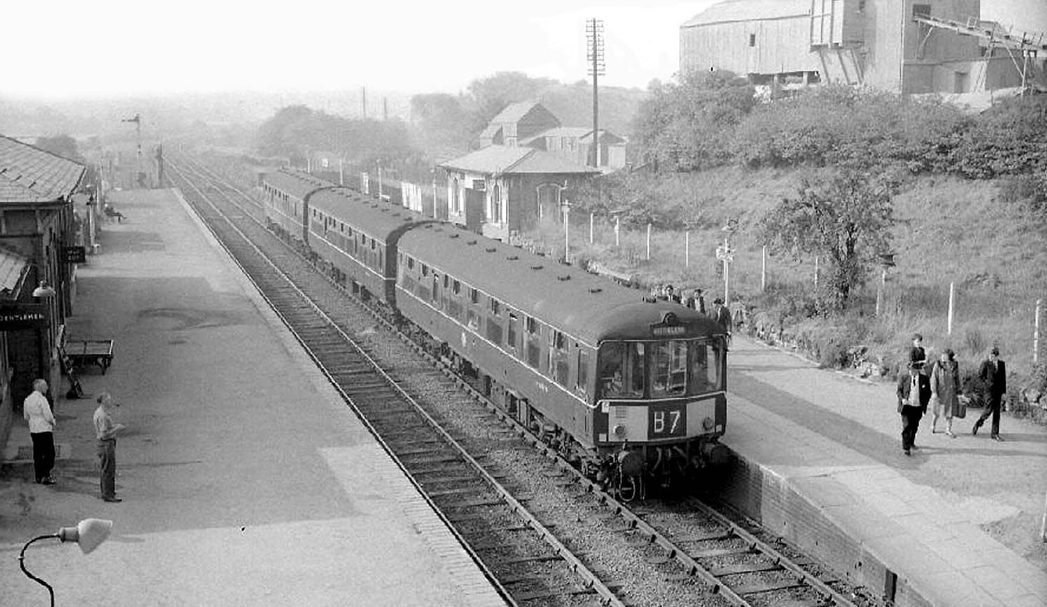 A three-car Diesel Multiple Unit stands at Abbey Street station with a service from Birmingham New Street in the 1960s
