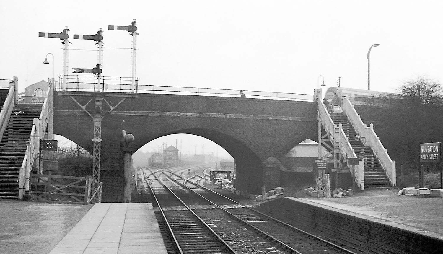 View of the steps leading up from both platforms to Midland Road and Abbey Street Junction Signal Box circa 1968