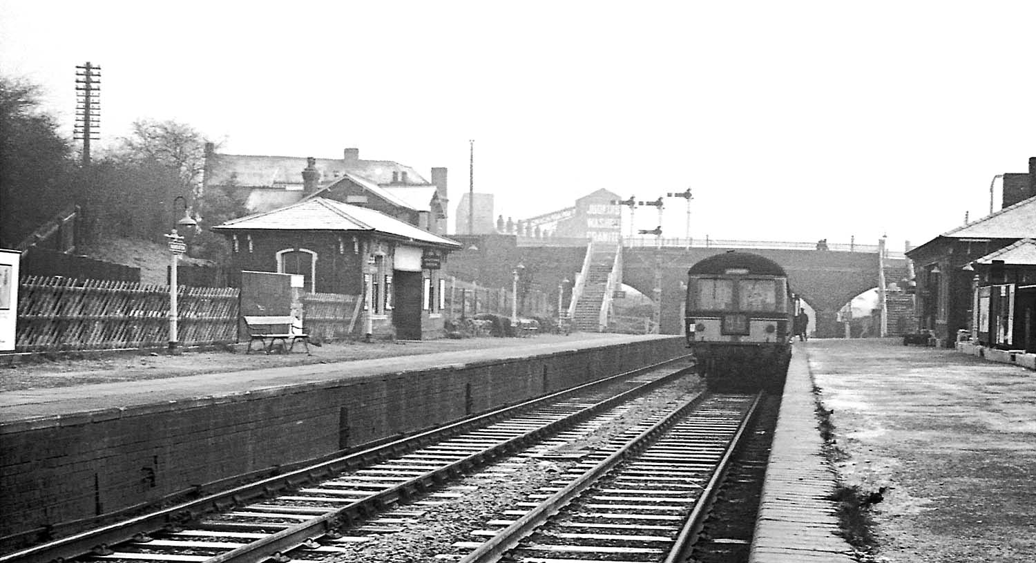 A Leicester to Birmingham Diesel Multiple Unit stands at the down platform ready to depart on 24th February 1968