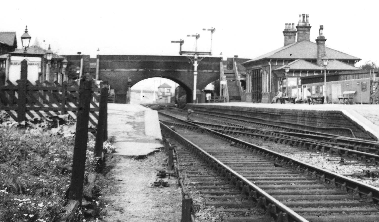Close up showing the Midland Railway signal gantry to be carrying lower quadrant semaphores