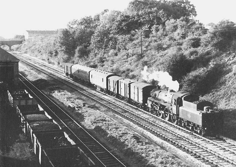 British Railways Standard Class 4 4-6-0 No 75022 is seen running tender first on a down freight on 5th September 1959