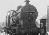 Ex-LMS 4F 0-6-0 No 44168 is seen being prepared for its next trip with the driver oiling the inside motion
