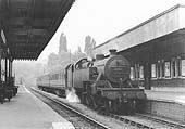 Ex-LMS 4P 2-6-4T No 42337 stands at the up platform with a three coach local passenger service to New Street on 19th June 1955