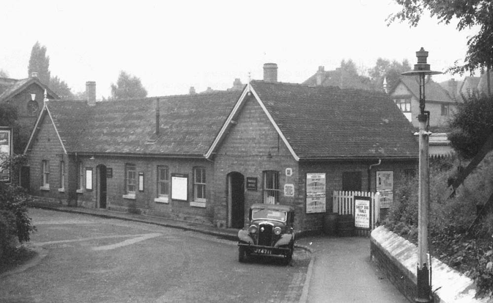 View of the access road leading to the front of Redditch station from Bromsgrove Road on 19th September 1958