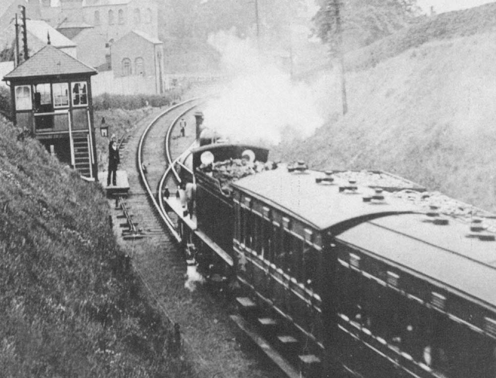 View of the gas works signal box as the signalman and fireman ready to exchange the train train staff