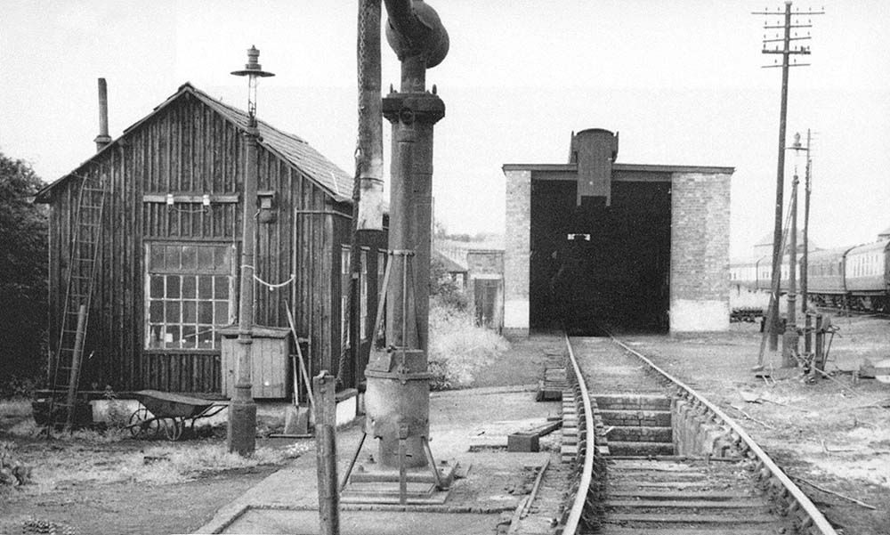 A 1952 view of Redditch engine shed, its enginemen's hut, the inspection pit and the water crane