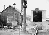 A 1952 view of Redditch engine shed, its enginemen's hut, the inspection pit and the water crane