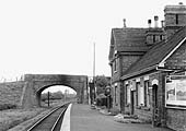 Looking along the platform towards Evesham with the over bridge carrying Station Road behind
