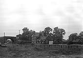 A panoramic view of Salford Priors station with the pedestrian entrances to the platform seen at both ends