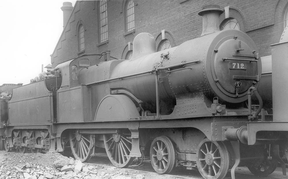 Ex-MR 3P No 712, a member of the MR's 2606 class, is seen standing alongside Saltley No 3 roundhouse with the Sand Drying Plant behind