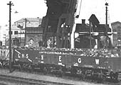 Close up view of the bottom of Saltley shed's coaling plant with the discharge chutes in black metal above the white control cabin