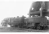 LMS 2-6-0+0-6-2 Garratt No 7994 stands alongside Saltley shed's coaling tower on its way to one of what were known as the 'back roads'