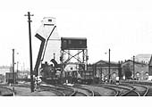Close up Saltley shed's newly erected mechanical coaling tower and ash disposal plant with several open wagons standing awaiting to be filled