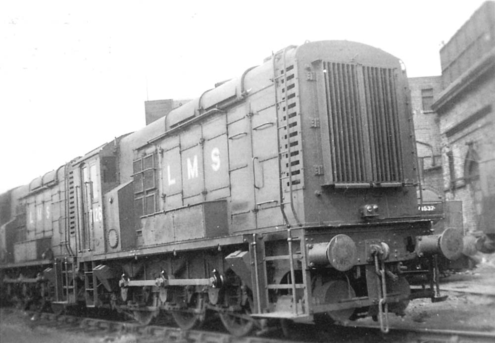 LMS 0-6-0 Diesel shunters, Nos 7126 and 7128, are seen standing on the road adjacent to Saltley shed's water tank located next to No 2 roundhouse