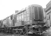 LMS 0-6-0 Diesel shunters, Nos 7126 and 7128, are seen standing on the road adjacent to Saltley shed's water tank located next to No 2 roundhouse
