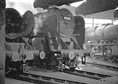 British Railways Standard Class 9F 2-10-0 No 92243 raises steam inside Saltley shed's No 3 roundhouse