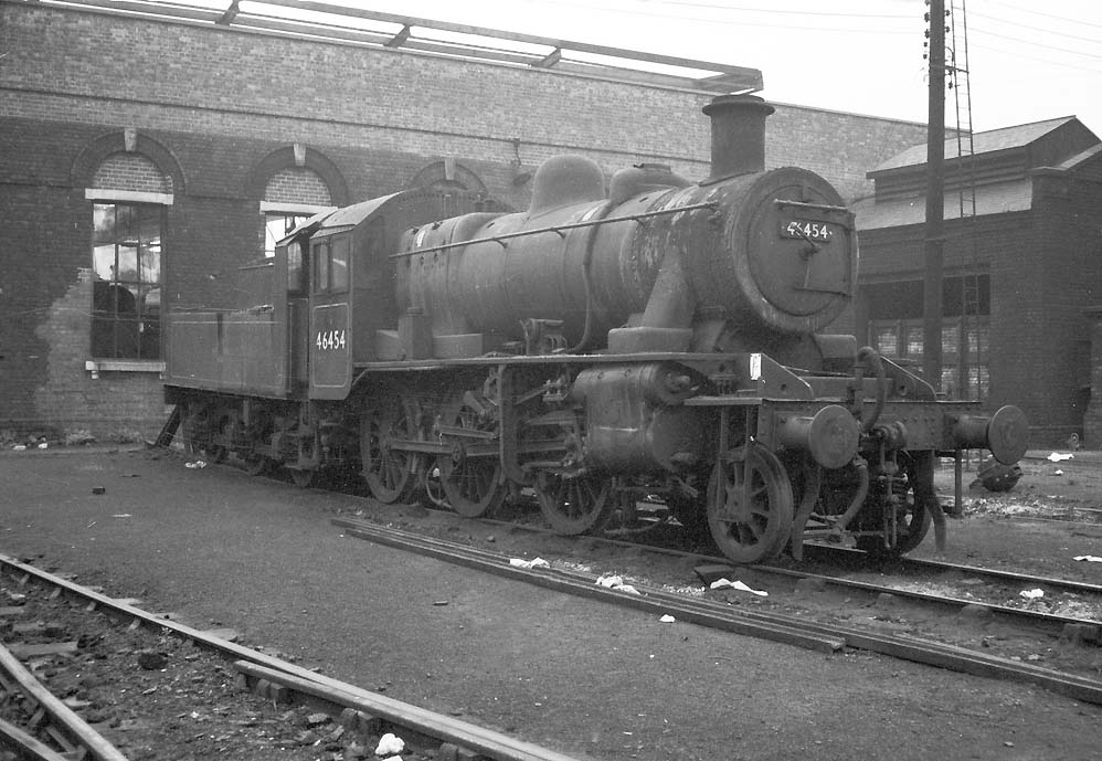 British Railways built 2MT 2-6-0 No 46454 stands outside No 3 roundhouse in a very dirty condition