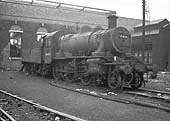 British Railways built 2MT 2-6-0 No 46454 stands outside No 3 roundhouse in a very dirty condition