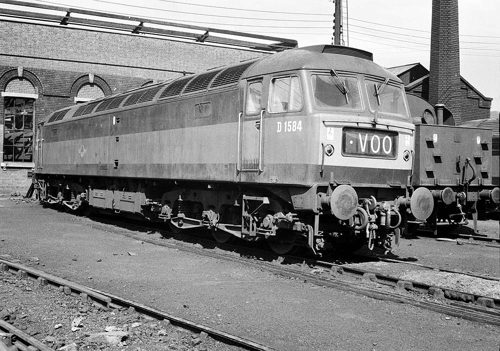 British Railways Type 4 D1584 standsin front of Saltley shed's No 3 roundhouse