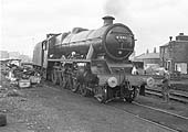Ex-LMS 5XP 4-6-0 'Jubilee class' No 45593 'Kolaphur' is seen taking on water at the entrance to Saltley shed