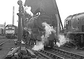 Ex-LMS 5MT 4-6-0 No 45308 moves forward from beneath Saltley shed's coaling plant after being coaled