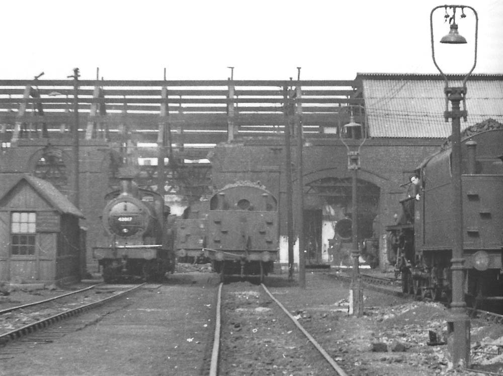 A general external view looking towards Saltley shed's No 3 roundhouse with locomotives stabled outside