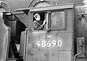 A teenage enthusiast looks from the cab of condemned ex-LMS 8F 2-8-0 No 48690 some three months after Saltley shed had closed