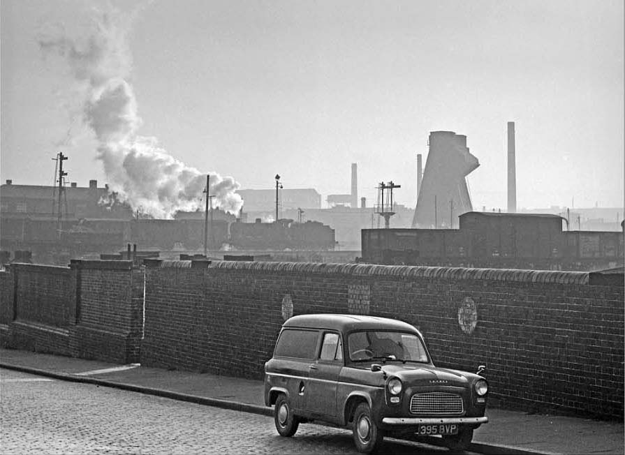 An ex-LMS 4F 0-6-0 locomotive, running tender first, starts the climb towards St Andrews Junction on 4th December 1965