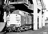 British Railways' English Electric Type 3 Co-Co D6811 stands beneath Saltley shed's coaling tower in 1968
