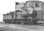 Ex-MR 0-6-0 3F 43246, with LMS still displayed on its tender, stands outside Saltley shed in 1949