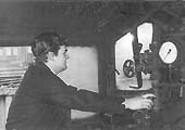 John Griffiths sits at the controls of British Railways built 2-6-0 4MT No 43049, one of 21a Saltley shed's 'Moguls' in 1961