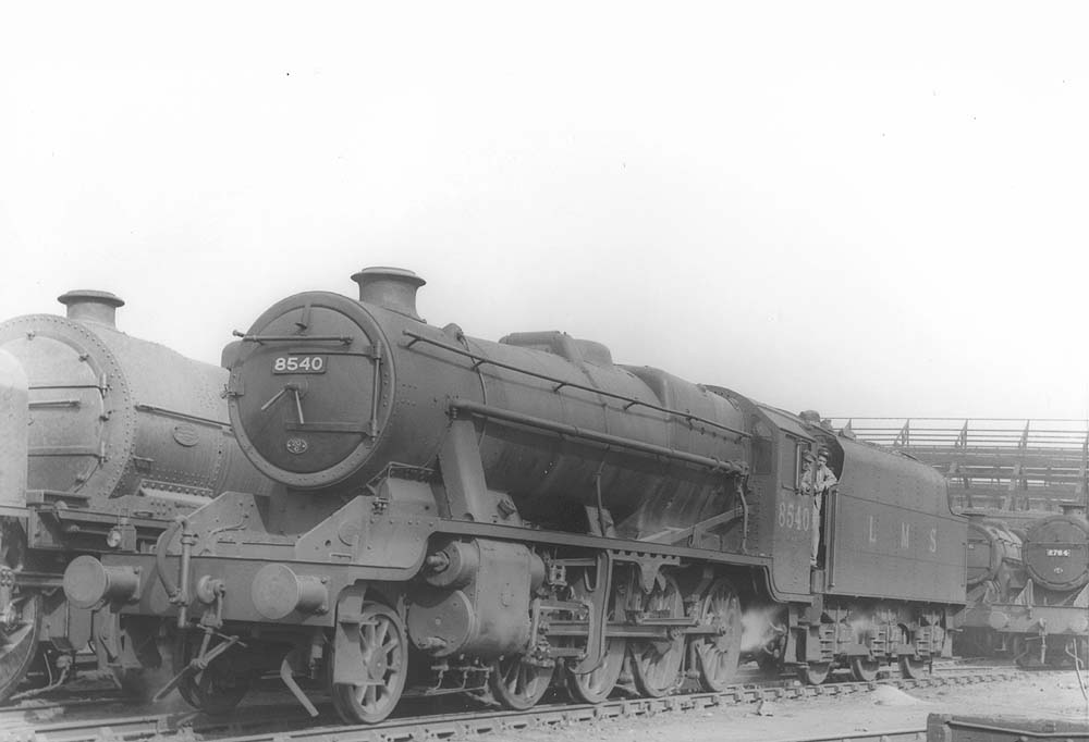 LMS 8F 2-8-0 No 8540 is seen standing ahead of LMS 6F5P 2-6-0 'Crab' No 2764 on one of the stabling roads in front of Saltley's No 3 roundhouse