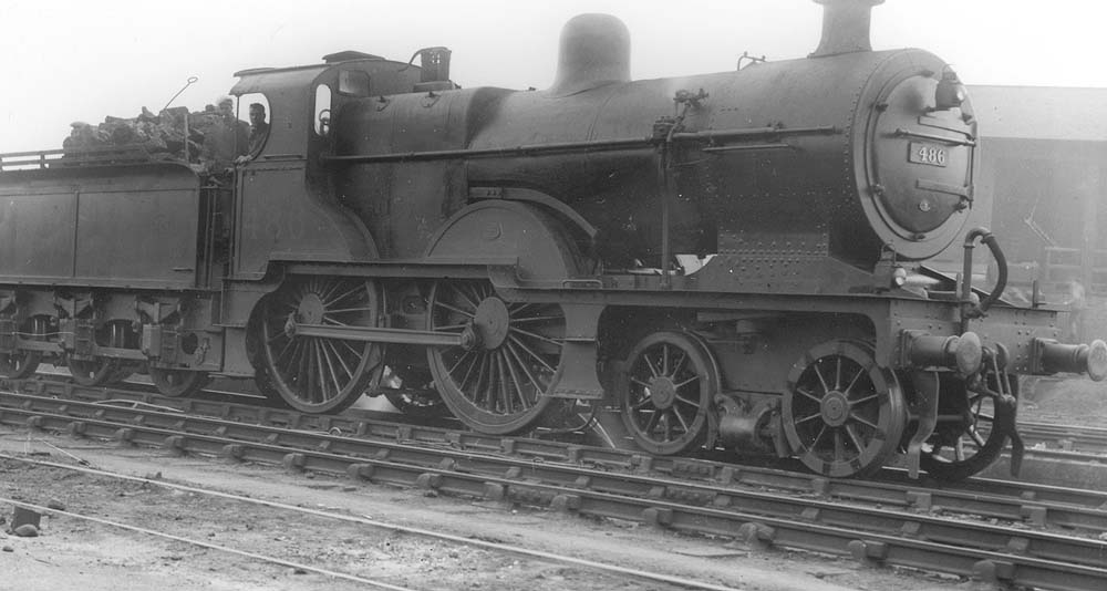 Ex-MR 2P 4-4-0 No 486, a member of the MR's 483 class, is seen leaving Saltley's yard with its lamps set for a Class D freight express trip