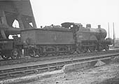 Ex-MR 2P 4-4-0 No 40511, a member of the MR's 483 class, is seen standing in front of an unidentified ex-LMS 3MT 2-6-2T and alongside Saltley's coaling plant
