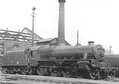 British Railways built Stanier Black 5 4-6-0 No 44660 is seen standing in front of No 3 roundhouse fully prepared for its next set of duties