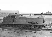 Ex-MR 0-6-4T 'Flatiron' No 2003 is seen standing at Saltley shed with coaled piled high on the bunker with boarding used to retain the poor quality coal