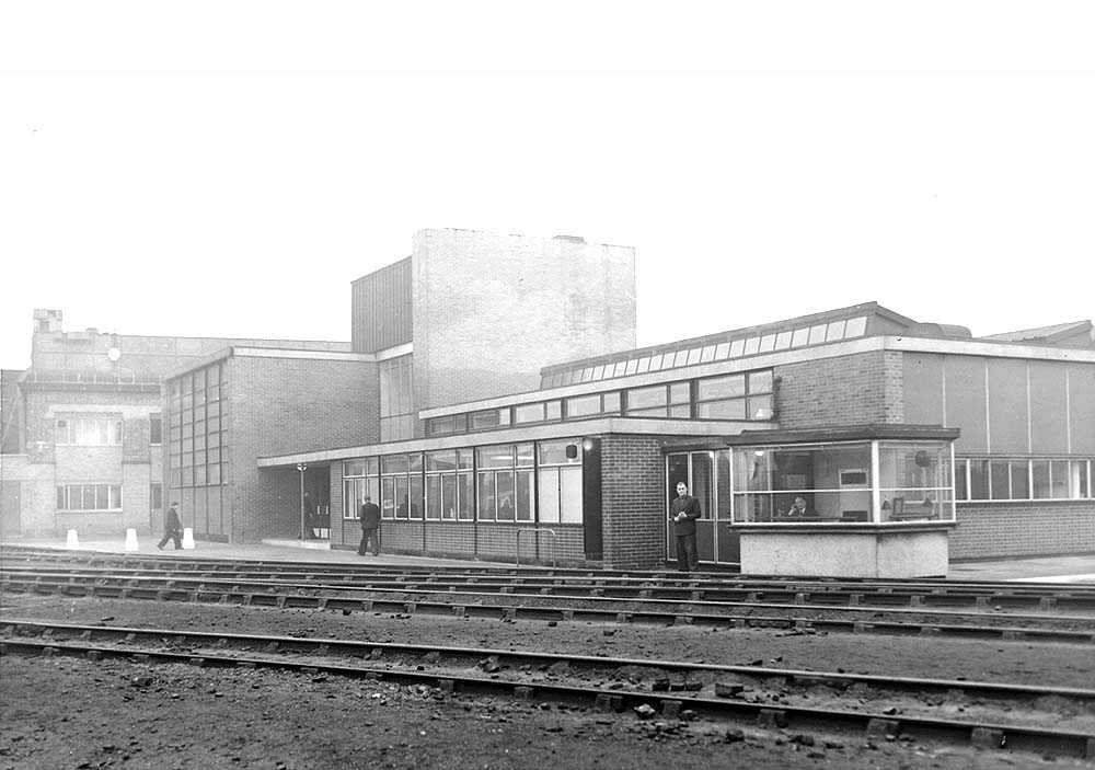 View of Saltley shed's new staff accomodation block on the right and the offices and locker rooms with tank on top in the distance