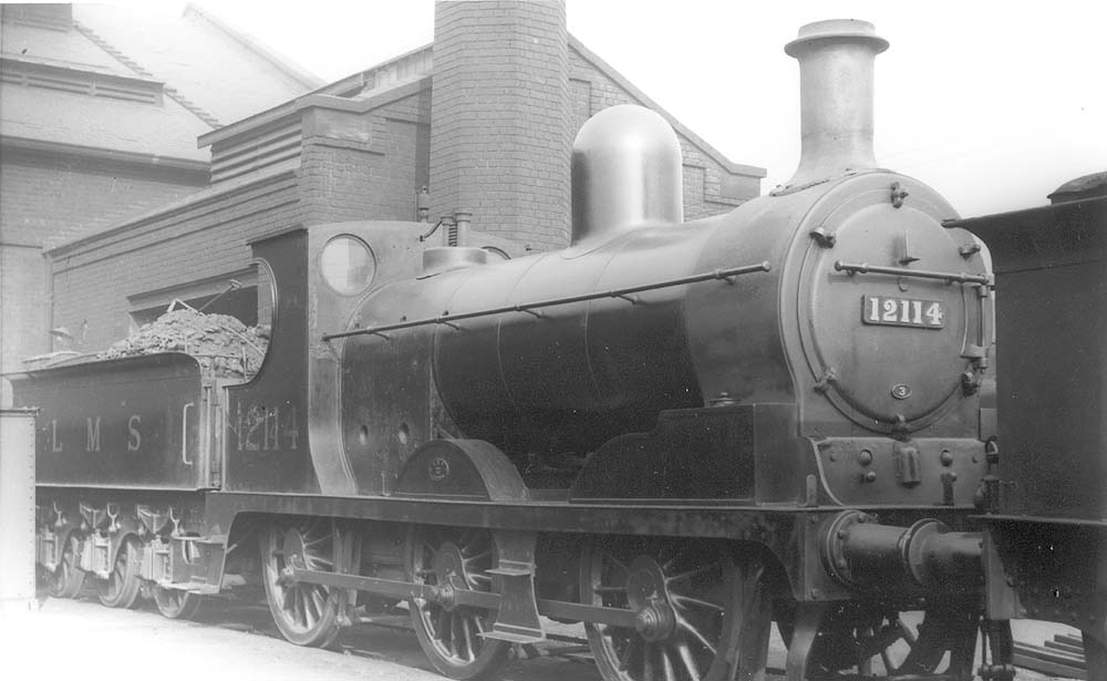 Ex-Lancashire & Yorkshire Railway 3F 0-6-0 No 12114, of the L&Y 11 class design, is seen standing with the Saltley's Sand Drier Plant in the background