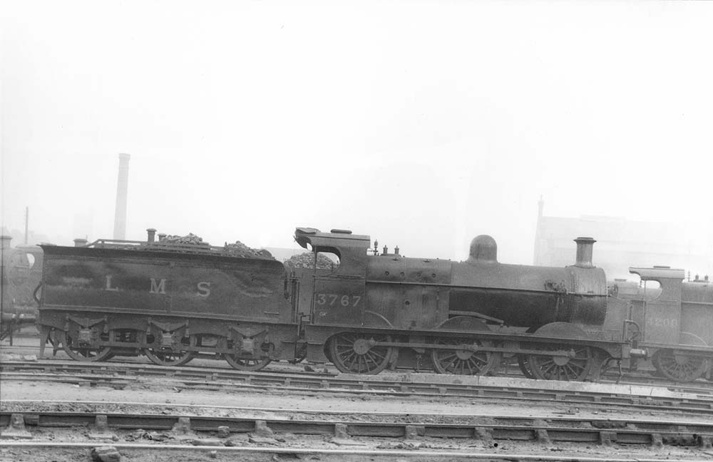 Ex-MR 3F 0-6-0 No 3767, a member of the MR's 2736 class, stands on the stabling roads outside Saltley shed's No 3 roundhouse